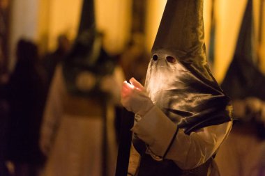 Marchena, SEVILLE, SPAIN - March 29, 2018: Procession of Holy Week('Semana Santa') in Marchena, SEVILLE. Holy Thursday afternoon. Procession of the Brotherhood of the 'Vera-Cruz'