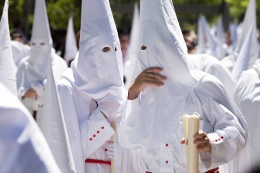SEVILLE, SPAIN - April 14, 2019: Procession of Holy Week in Seville. Palm Sunday Morning. Procession of the Sacramental Brotherhood of Our Father Jesus of Victory and Most Holy Mary of Peace 'La Paz'