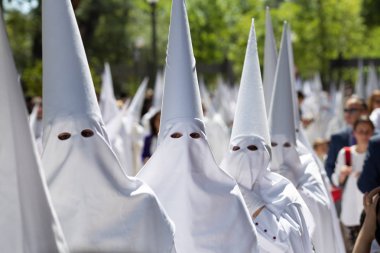 SEVILLE, SPAIN - April 14, 2019: Procession of Holy Week in Seville. Palm Sunday Morning. Procession of the Sacramental Brotherhood of Our Father Jesus of Victory and Most Holy Mary of Peace 'La Paz'