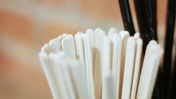 Close Wooden Stick Plastic Tubes Tea Coffee — Stock Video