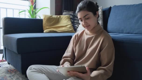 Anonymous Young Woman Sitting Sofa Writing Using Digital Tablet Computer — Stock Video
