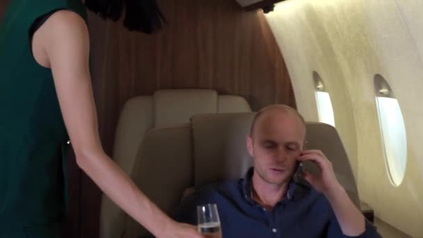 Young Businessman Drinks Champagne Sitting His Business Jet Young Girl — Stock Video