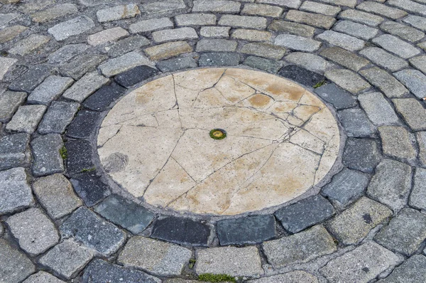 Fondo Con Conjunto Adoquines Con Una Piedra Circular Centro —  Fotos de Stock