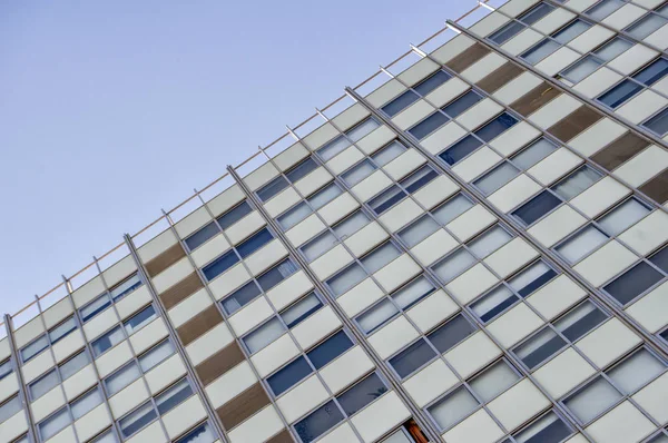 stock image Fragment of white facade with windows of a skyscraper in Madrid. Spain