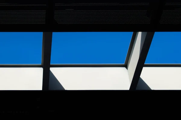 skylight divided into three parts laying the sky