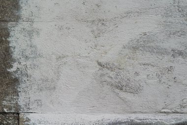 bir yama metin için beyaz boya ile duvar