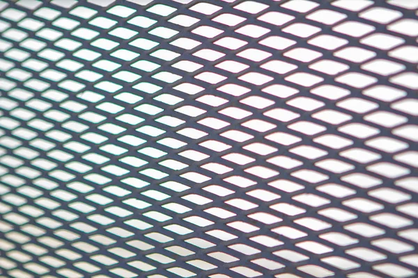 Diamond grid pattern metal fence — Stock Photo, Image