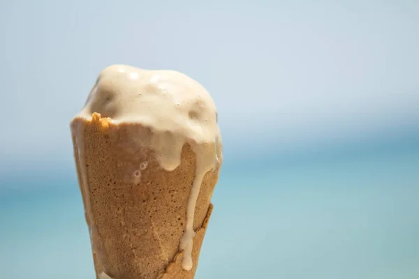 Melted ice cream cone in a waffle cone — Stock Photo, Image