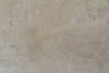 Kum rengi doku kesintisiz boş kum duvar kökenli