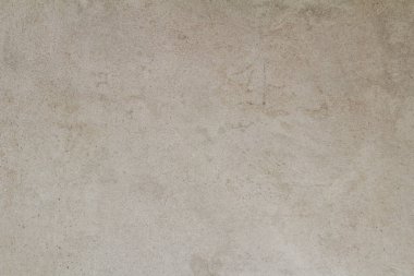 Kum gri renkli doku kesintisiz boş kum duvar kökenli