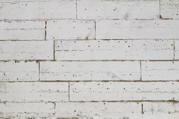 Textura de pared de ladrillo blanco utilizada para hacer el fondo adecuado para interiores y exteriores . — Foto de Stock