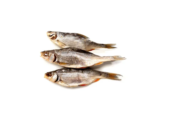 Palitos de peixe salgados secos isolados em branco. — Fotografia de Stock