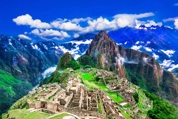 Machu Picchu, Cusco, Peru: Overview of the lost inca city Machu Picchu with Wayna Picchu peak Royalty Free Stock Photos