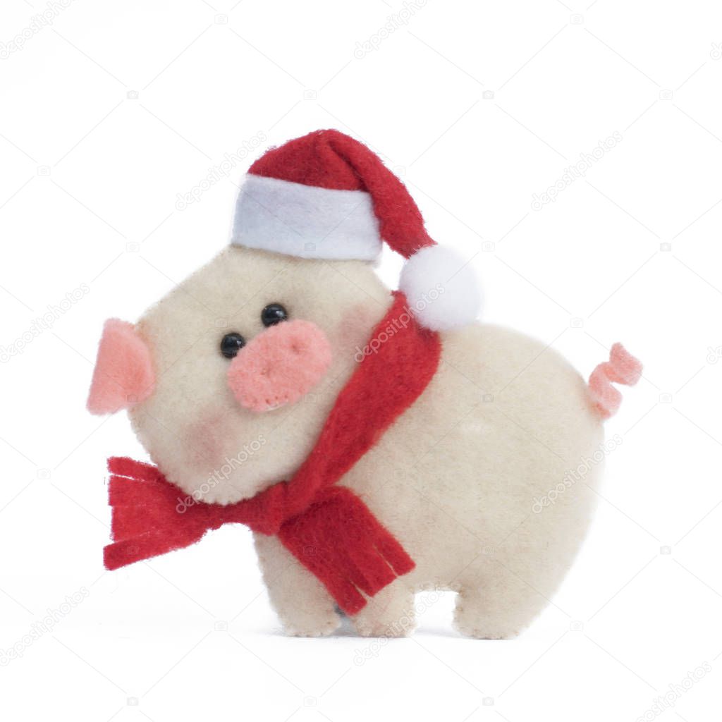 Toy pig on a white isolated background.