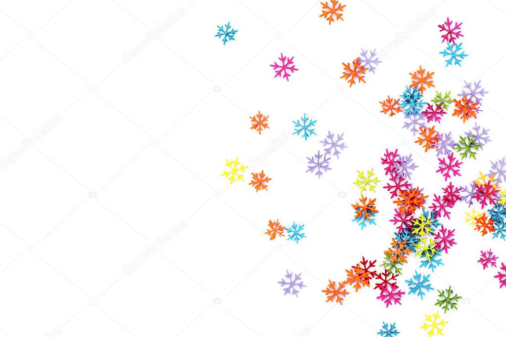Colored snowflakes on a white isolated background.