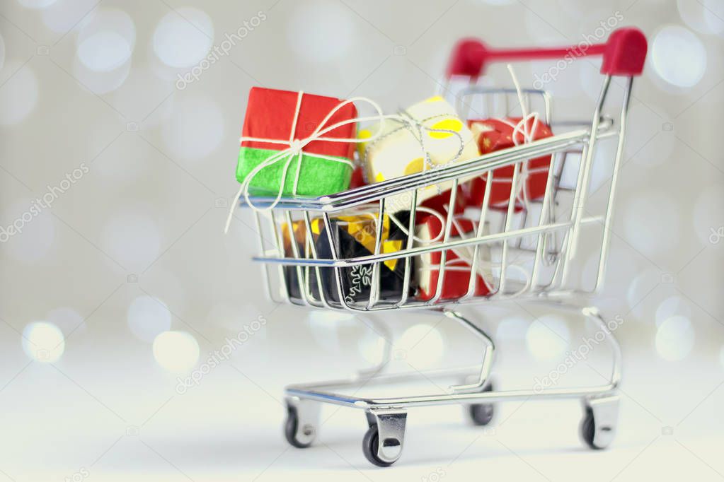 Holiday Concept: Shopping Trolley Filled with, Christmas Gifts 