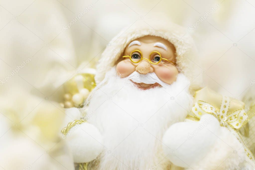 Christmas Santa in golden clothes close up
