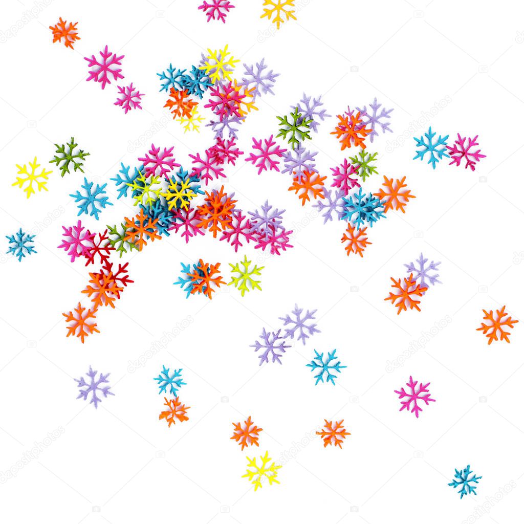 Bright colored snowflakes on a white background