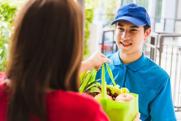 Asian Young Delivery Man Uniform Making Grocery Service Giving Fresh — Stock Photo, Image