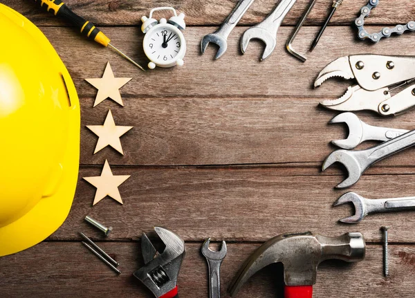 Happy holiday Labor day, different kinds wrenches on wooden desk table. first Monday in September, creation of the labor movement and dedicated to social and economic achievements of American workers