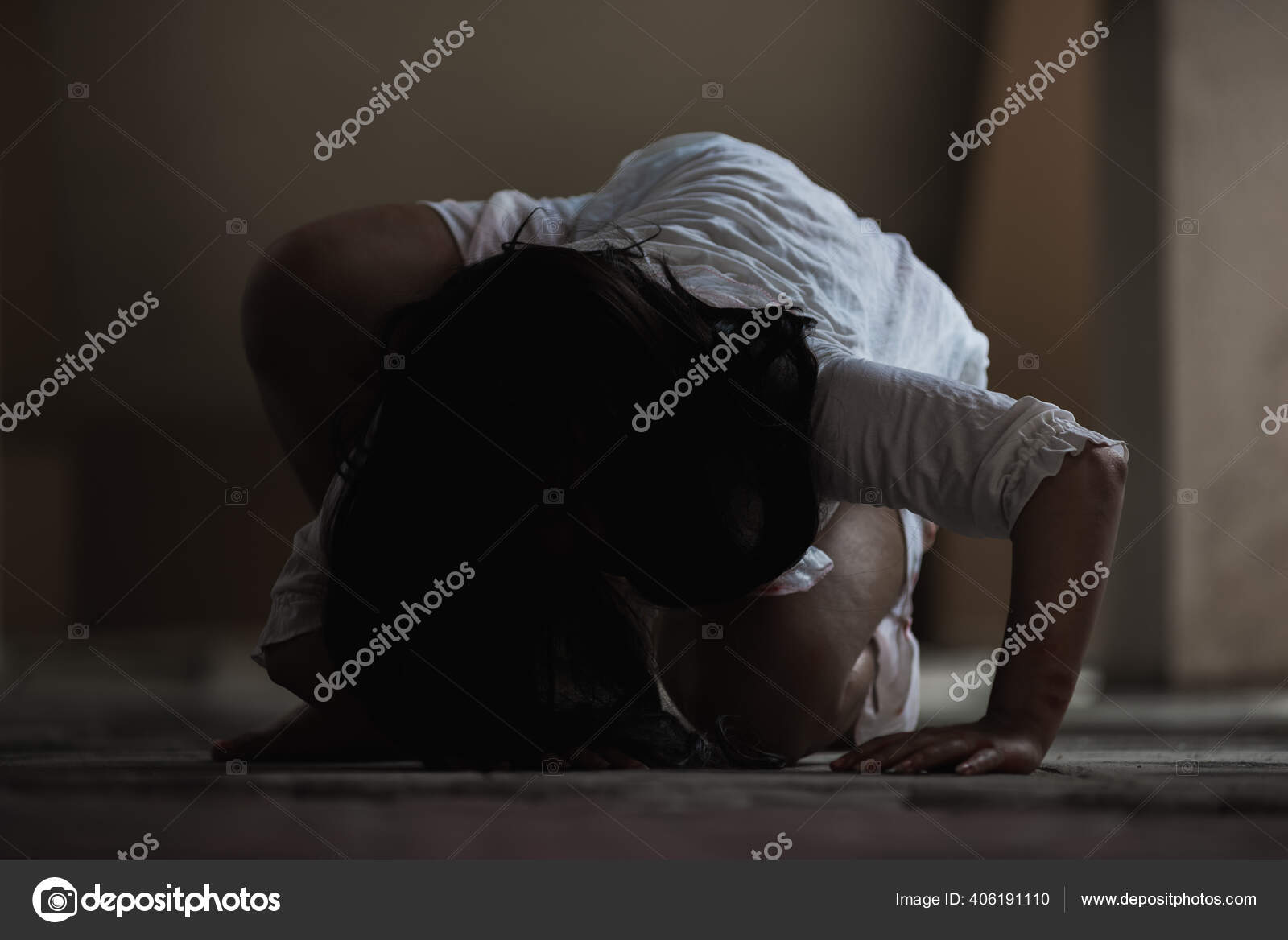 Portrait Of A Scared Girl With Blood On Her Face Looking At Camera