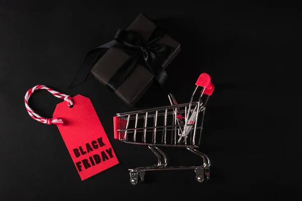 Kara Cuma Alışveriş Konsepti Hediye Kutusu Manzarası Alışveriş Arabasında Siyah — Stok fotoğraf