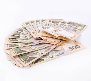 Para arka plan, beyaz arka plan üzerinde bir el ile bitti, Ukrayna para birimi izole Ukraynalı hryvnia