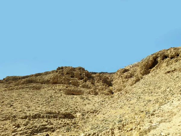 Desert land landscape with rocks, hills and mountains