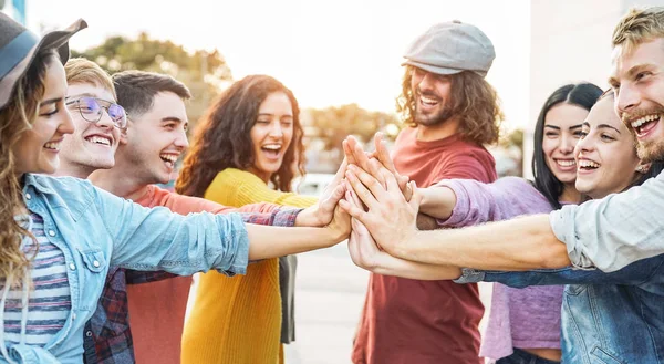Young Friends Stacking Hands Outdoor Happy Millennial People Having Fun Stock Photo