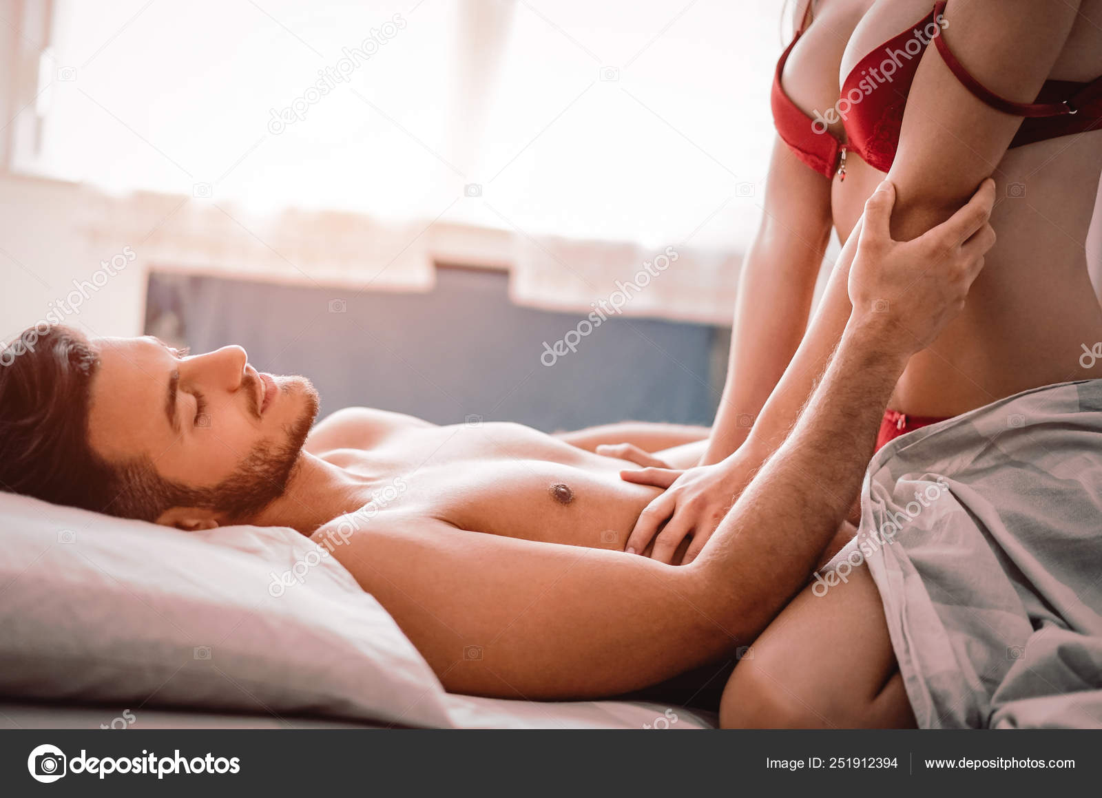 Couple Having Sex On Bed