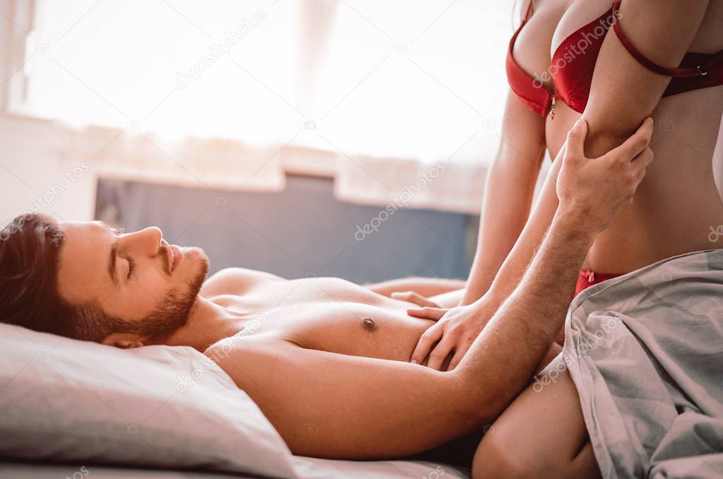 depositphotos_251912394-stock-photo-young-couple-having-sex-bed.jpg
