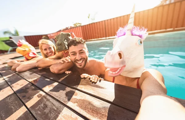 Crazy Friends Selfie Doing Pool Party Wearing Bizarre Mask Young — Stock Photo, Image