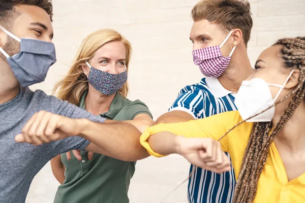 Young Friends Wearing Face Mask Doing New Social Distancing Greet Stock Image