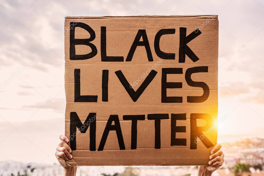 Black lives matter banner - Activist movement protesting against racism and fighting for equality - Social protests and human rights concept