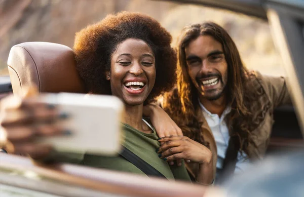 Happy Young Couple Taking Selfie Mobile Smartphone While Doing Road Stock Image