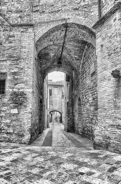 Walking in the picturesque and ancient streets of Assisi, one of the most beautiful medieval towns in central Italy