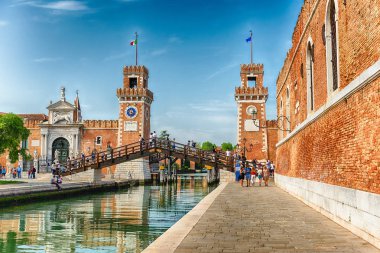 VENICE, ITALY - APRIL 29: The scenic entrance to the Venetian Arsenal, a complex of former shipyards and armories clustered together in the city of Venice, Italy, April 29, 2018 clipart