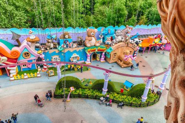 CASTELNUOVO DEL GARDA, ITALY - MAY 1: Aerial view inside Gardaland Amusement Park, near Lake Garda, Italy, May 1, 2018. The park attracts nearly 3 million visitors every year clipart