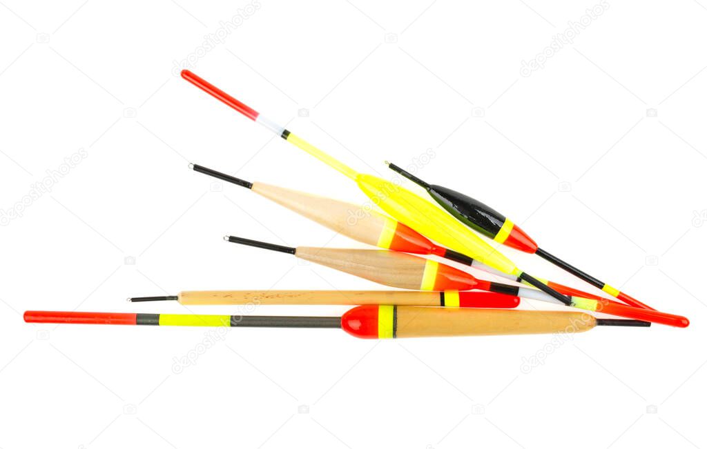 bright tackle fishing floats on a white background, isolated