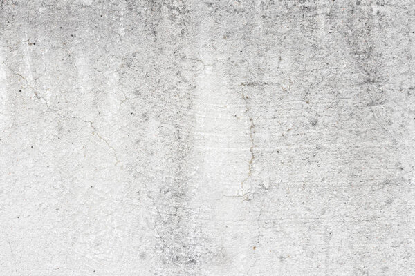 Concrete texture. Concrete wall with cracks and spills.Gray concrete wall.  