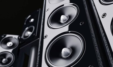 Multimedia speaker system closeup over black background clipart