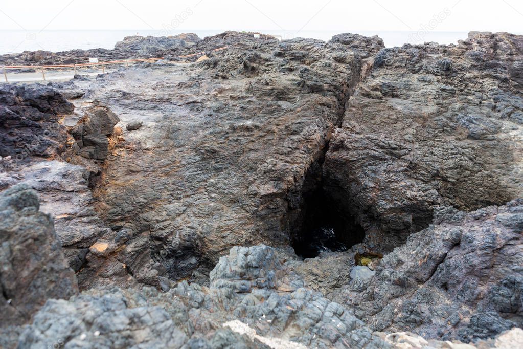 Kiama Blowhole, NSW, Australia. Natural hole in earth close to the sea through which sea water occasionally bursts.