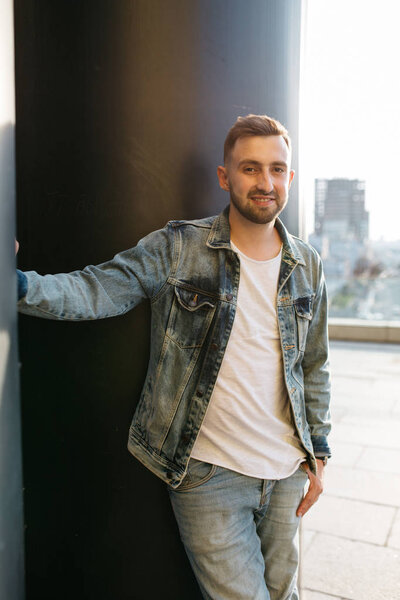 portrait of man in casual clothing in cityspace