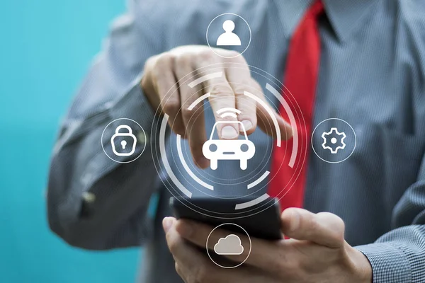 Businessman presses button smart or intelligent car icon.