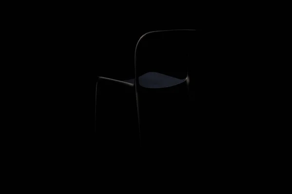 Modern black matte plastic chair on black background. 3d render