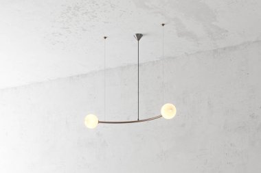 Modern bronz lamba. Çatı katı tarzında. Lamba beton duvar arka plan üzerinde döndü. 3D render
