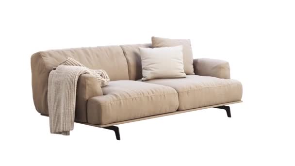 モダンなベージュ生地のソファの円形アニメーション 枕付きの繊維張りのソファと白い背景にスローされます 半世紀 ロフト シャレー 北欧インテリア 回転式3Dレンダリング — ストック動画