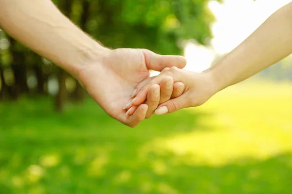 Hands Happy parents and child outdoors in the park — Stock Photo, Image