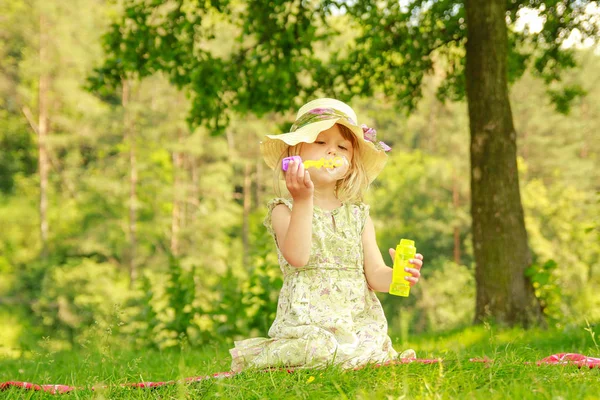 Happy child having fun playing in the nature park — Stock Photo, Image