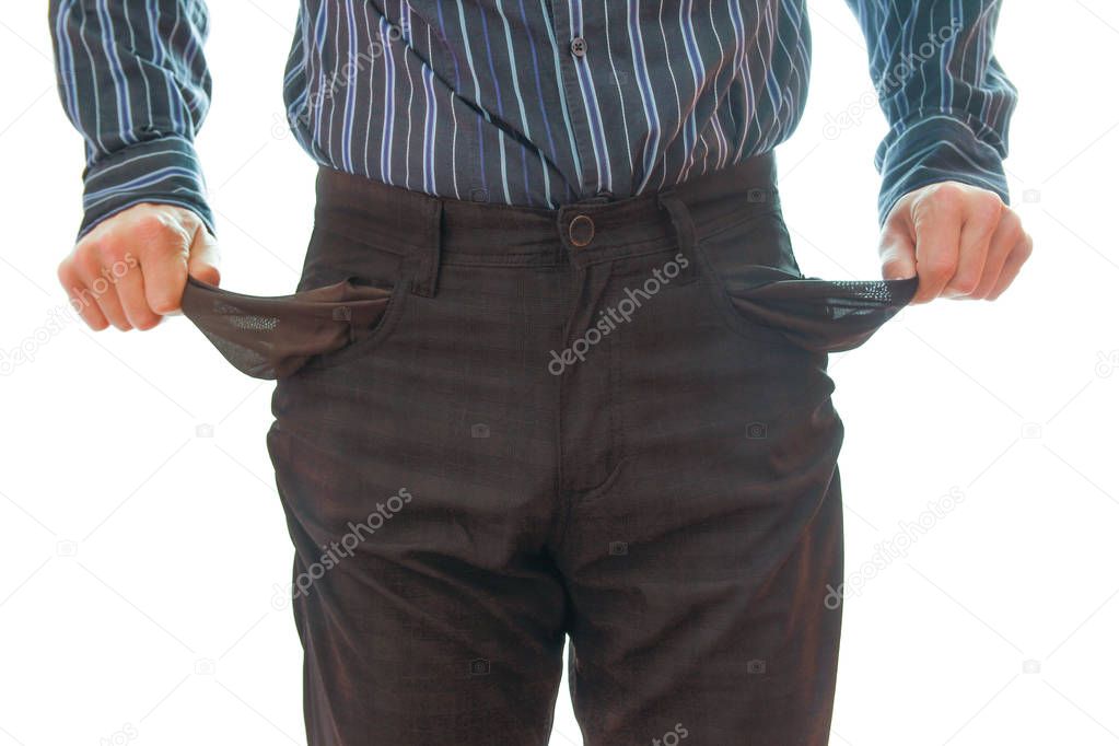 bankrupt business man showing empty pockets hands